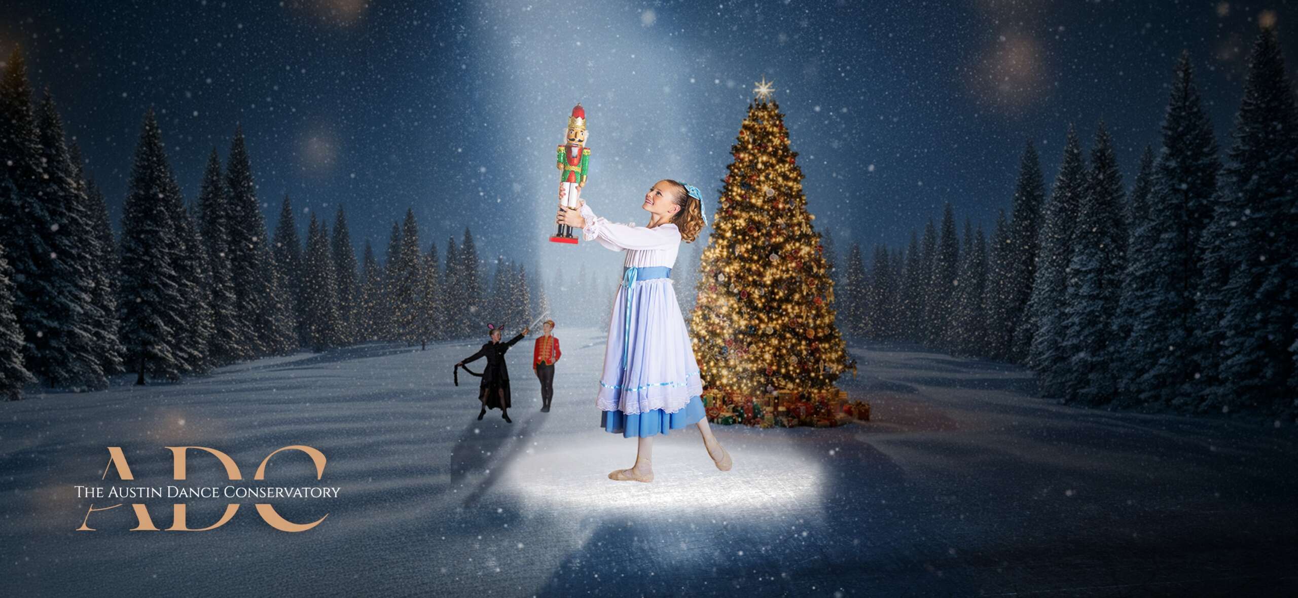 Clara holds the Nutcracker in a snowy forest beside a glowing Christmas tree — The Austin Dance Conservatory presents The Nutcracker
